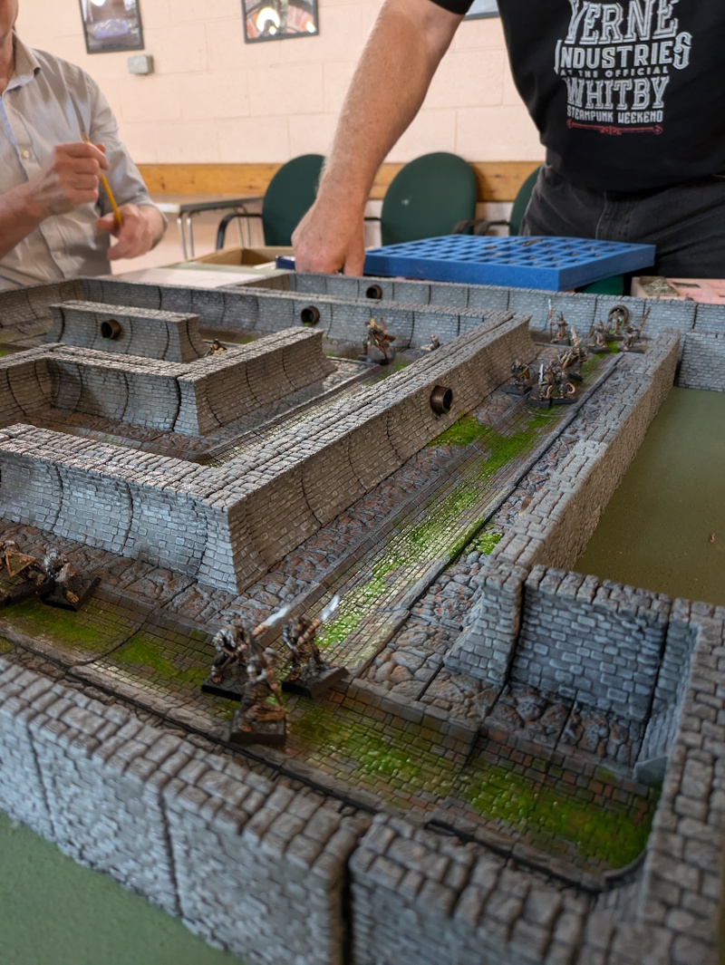 A game of dungeons and dragons game under way in a dungeon